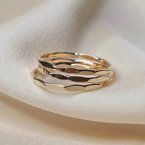 14K gold-filled textured stacking ring by MANDOTOS featuring a polished, intricate design on a sleek band.