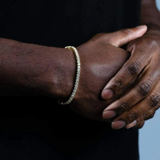 18K gold plated zircon tennis bracelet by MANDOTOS with sparkling cubic zirconia stones on a delicate chain.