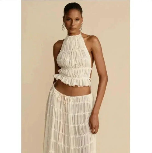 Mandotos 2-piece chic halter dress suit set featuring a stylish halter top and matching skirt in elegant fabric.