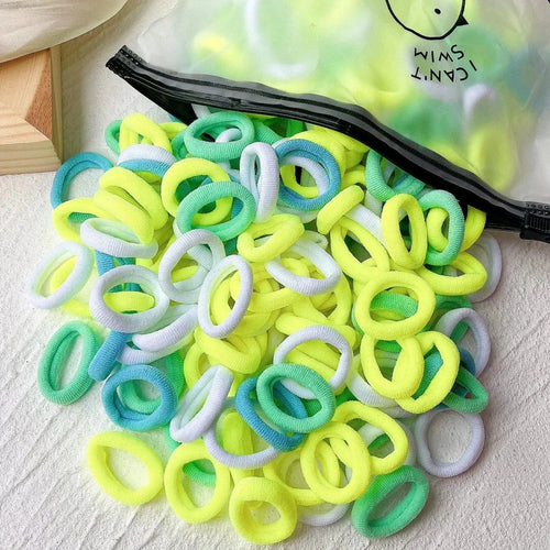 Set of 20/50 elastic hair bands for kids, colorful sweets-themed scrunchies and hair ties by MANDOTOS, for girls and children.