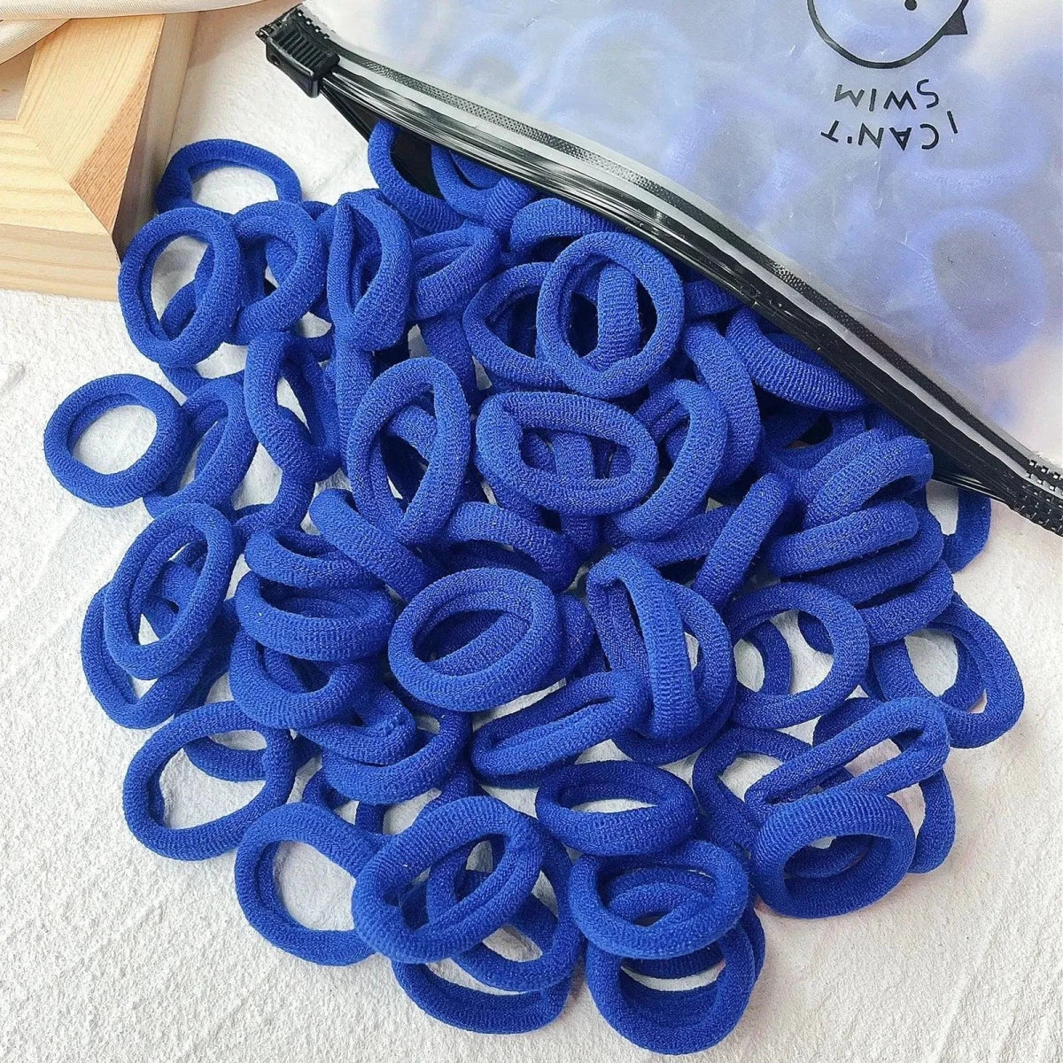 Set of 20/50 colorful elastic hair bands and scrunchies for kids, ideal for girls' hair ties, clips, and headbands.