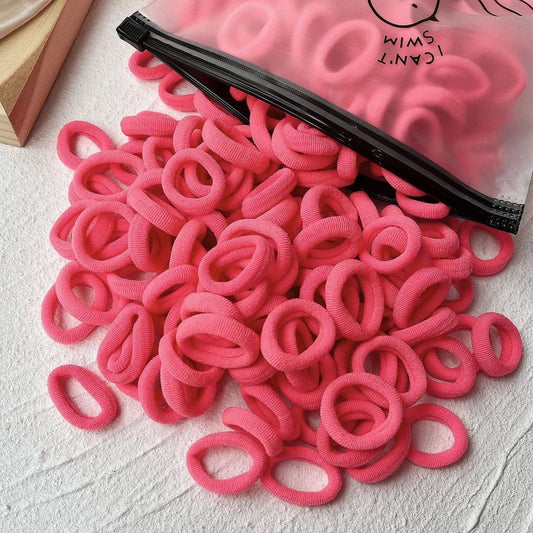 Set of 20/50 colorful kids' elastic hair bands by MANDOTOS, featuring sweet-themed scrunchies and hair ties for girls and children.