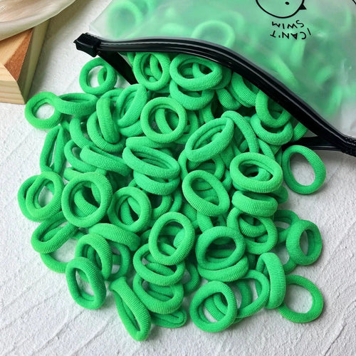 Set of 20/50 kids elastic hair bands with colorful sweets design, suitable for girls' hair ties, clips, and headbands by MANDOTOS.