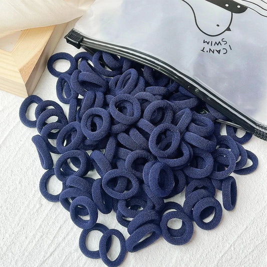 Set of 20/50 kids elastic hair bands featuring colorful sweets designs, ideal for girls' hair ties, scrunchies, and baby hair accessories.