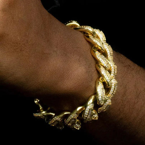 Luxury 20mm gold Cuban bracelet by MANDOTOS featuring bold, polished links in a stylish jewelry design.