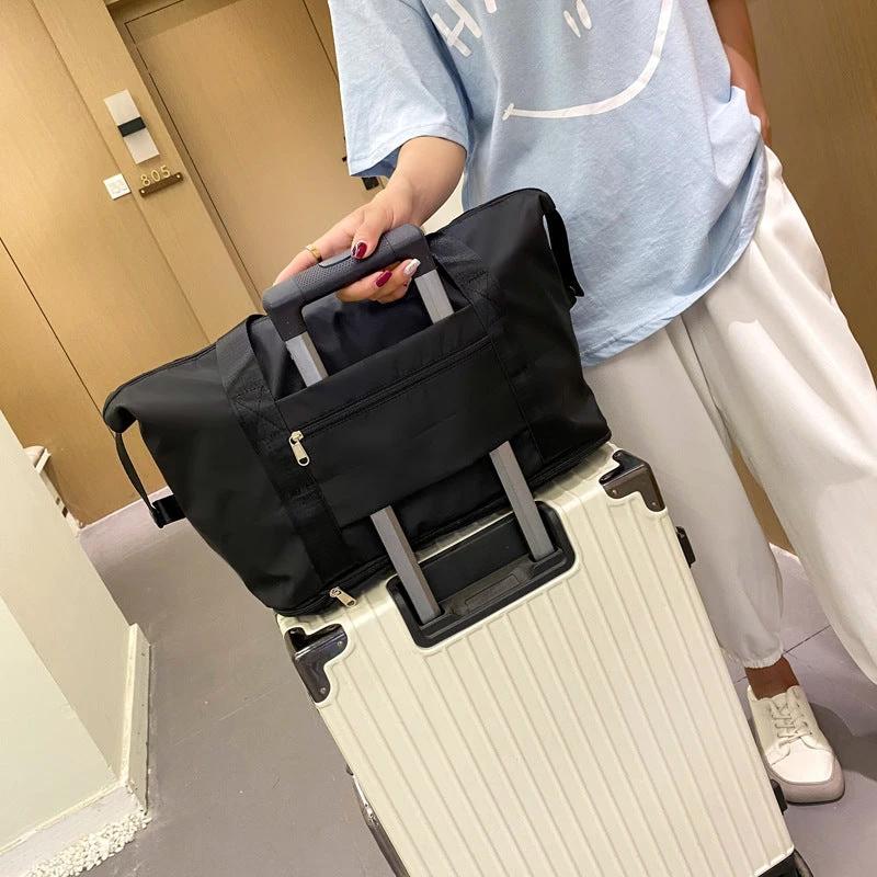 Mandotos foldable waterproof travel bag with large capacity, ideal for gym, fitness, weekender, and overnight trips for women.