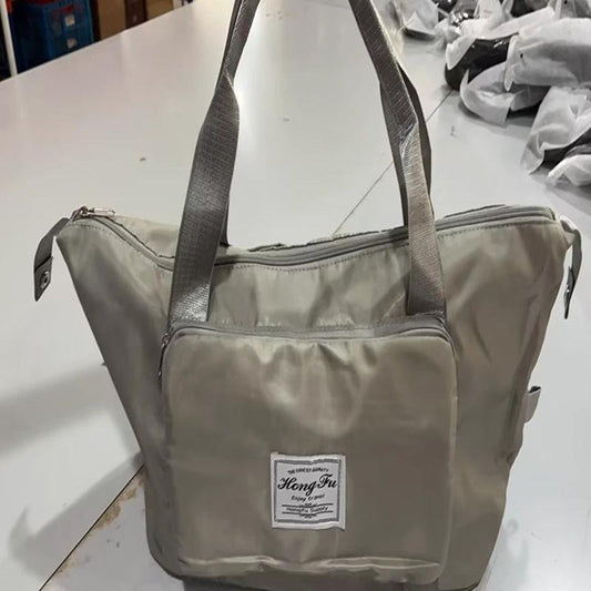 Mandotos foldable waterproof travel bag with large capacity, ideal for gym, fitness, and overnight trips for women.