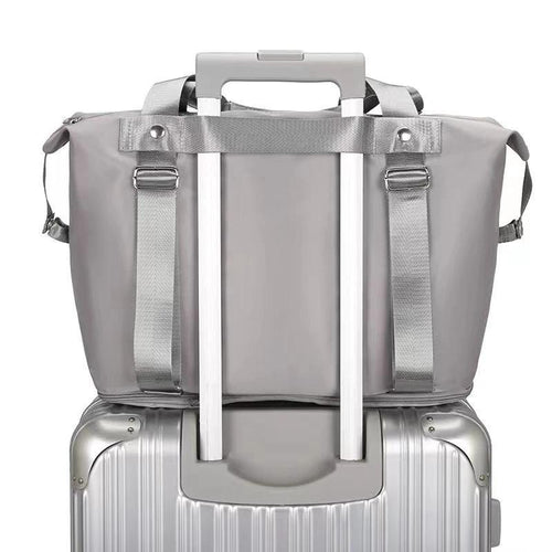 Mandotos folding travel bag for women, versatile backpack, shoulder, gym, weekender, and overnight bag in compact design.