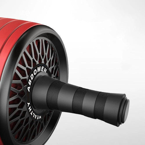 Mandotos ab roller wheel with knee pads for core training, showing the roller and padded knee support on a workout surface.