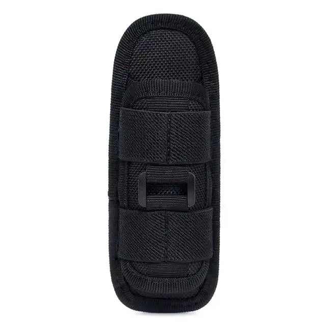 Mandotos Adventure Belt Flashlight Carrier attached to a rugged outdoor belt, designed for secure flashlight storage during activities.
