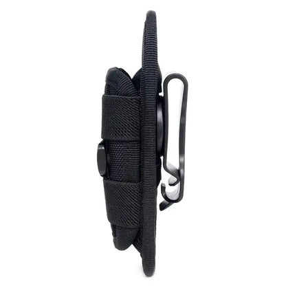 Mandotos Adventure Belt Flashlight Carrier worn around the waist, designed to hold and secure a flashlight during outdoor activities.