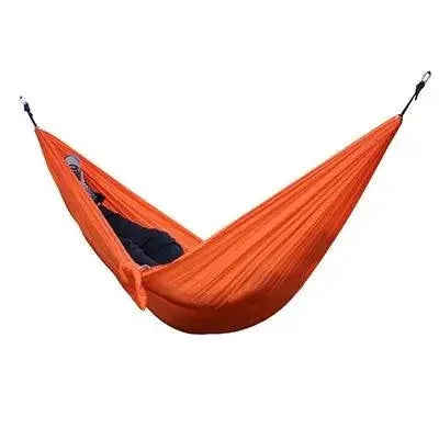 Mandotos Adventure Hammock Pack with lightweight hammock, straps, and carabiners for outdoor camping and relaxing.