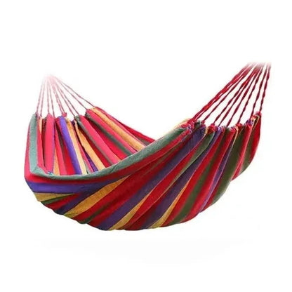Mandotos Adventure Ready Hammock hanging between trees, lightweight and durable for outdoor camping and relaxing.