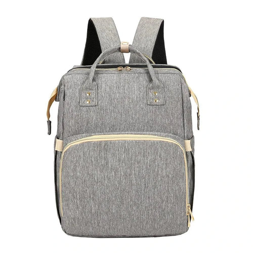 Mandotos all-in-one stroller diaper backpack with multiple compartments and adjustable straps for parents and babies.