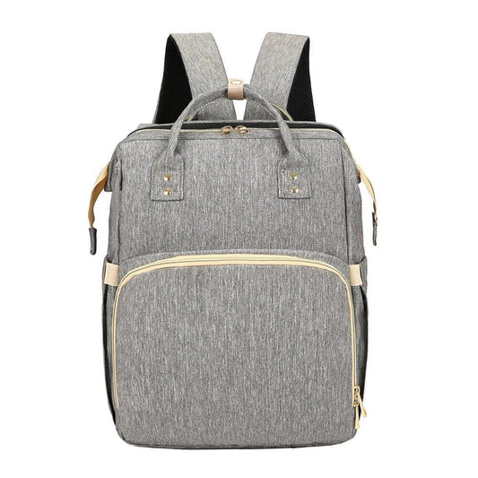 Mandotos all-in-one stroller diaper backpack with multiple compartments and adjustable straps for parents and babies.