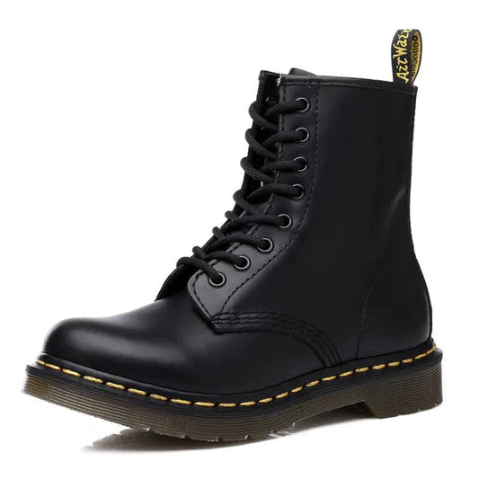 Mandotos all-season leather boots featuring a sleek design, durable leather material, and comfortable ankle height for versatile wear.