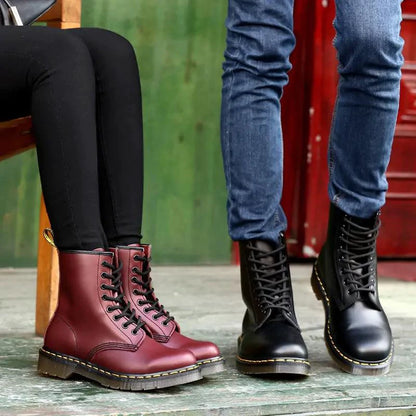 All-season leather boots by MANDOTOS featuring stylish design and durable leather material for versatile outdoor wear.