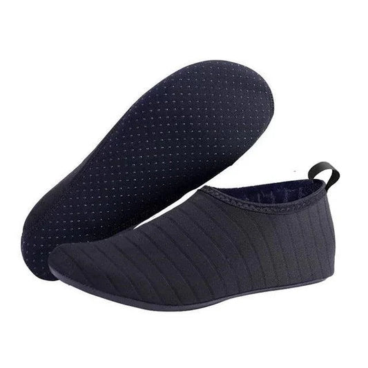 Mandotos AquaFlex unisex water shoes featuring quick-dry material, flexible soles, and a snug fit for beach, yoga, and swimming activities.