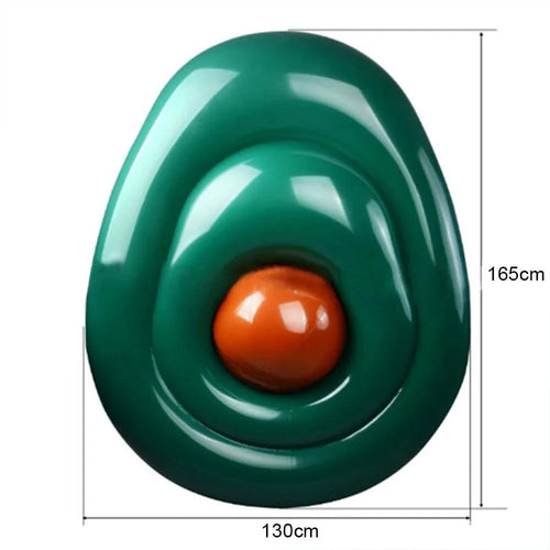 Mandotos avocado-shaped inflatable pool filled with water, perfect for summer relaxation and outdoor fun.