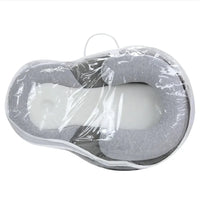 Baby Anti-Spit Up Pillow by MANDOTOS, soft and supportive pillow designed to reduce spit-up for infants.