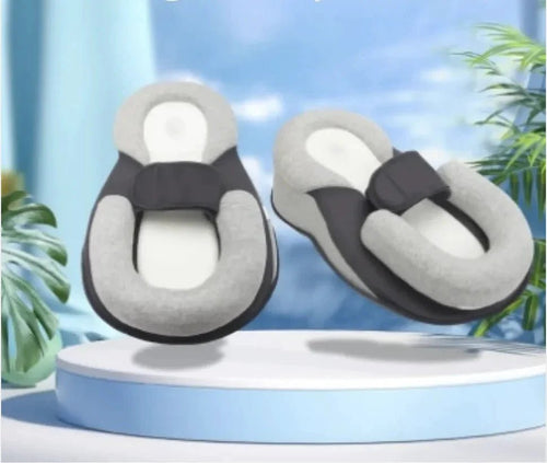 Mandotos baby anti-spit up pillow with soft fabric and supportive design for comfortable feeding and burping.