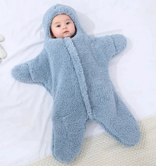 Soft baby quilt from MANDOTOS with colorful patterns, perfect for keeping infants warm and comfortable.