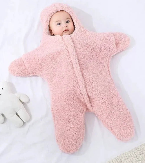 Soft baby quilt by MANDOTOS featuring colorful patterns, ideal for nursery comfort and gentle cuddles.