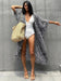Mandotos Beach Chic Cover-Up featuring lightweight, breezy fabric, perfect for sun-kissed beach outings and effortless summer style.