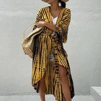 Lightweight MANDOTOS Beach Chic Cover-Up with breezy, stylish fabric perfect for sun-kissed beach outings and summer adventures.