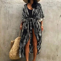 Mandotos Beach Chic Cover-Up featuring lightweight, stylish fabric perfect for sun-kissed beach outings and relaxed summer adventures.