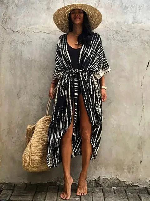 Mandotos Beach Chic Cover-Up featuring lightweight, stylish fabric perfect for sun-kissed beach outings and relaxed summer adventures.