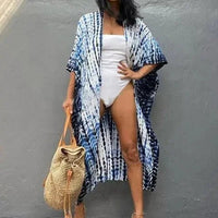 Mandotos Beach Chic Cover-Up featuring lightweight, flowy fabric perfect for sun-kissed beach adventures and effortless summer style.