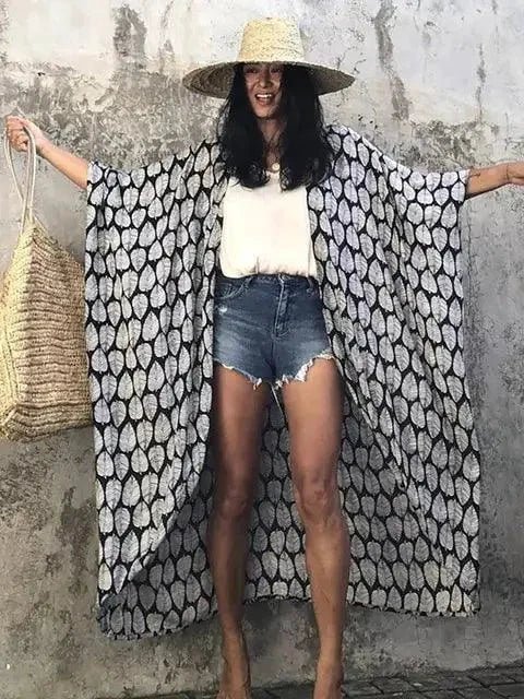 Mandotos Beach Chic Cover-Up with lightweight fabric and stylish design, perfect for sun-kissed beach adventures.