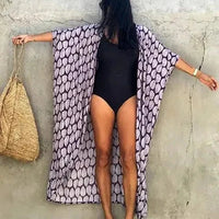 Mandotos Beach Chic Cover-Up with lightweight, flowy fabric ideal for sun-kissed beach adventures and effortless summer style.