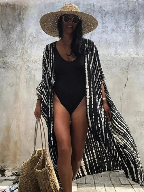 Mandotos Beach Chic Cover-Up with lightweight fabric, stylish design, perfect for sun-kissed beach adventures.