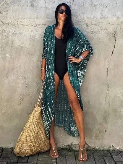 Mandotos Beach Chic Cover-Up featuring lightweight, stylish fabric perfect for sun-kissed beach adventures and effortless summer style.