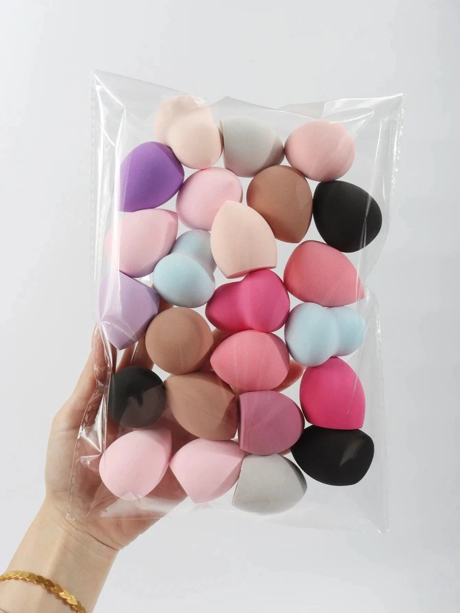 Set of 6 to 60 MANDOTOS beauty sponges and foundation mixing puffs for flawless makeup application, shown in various sizes.
