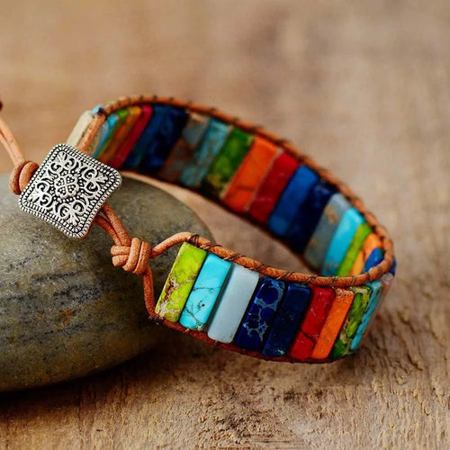 Mandotos boho chic leather bracelet featuring layered straps and metal accents, stylish and adjustable for a trendy look.