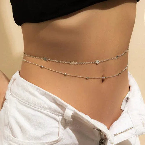 Mandotos Boho Glam belly chain with intricate gold design, featuring layered chains and bohemian style for a fashionable look.