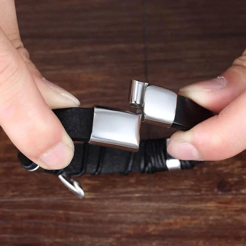 Mandotos bonded love leather bracelet with metal accents, stylish accessory featuring woven leather band and adjustable closure.