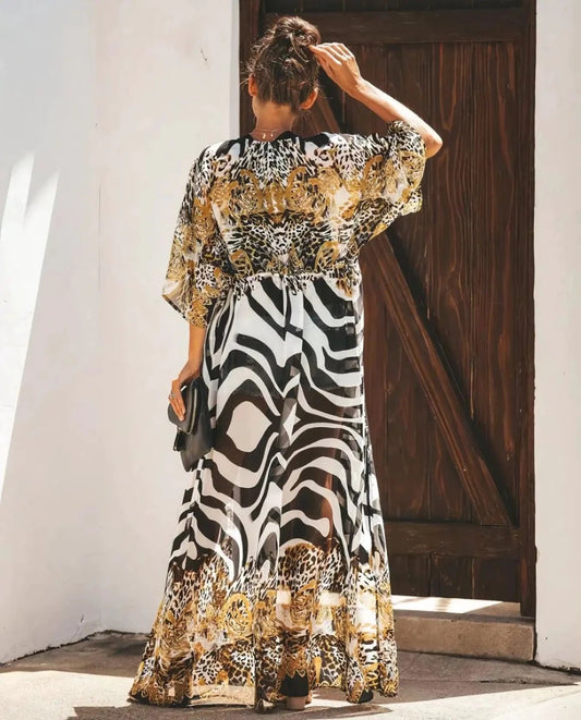 Mandotos Breeze Kimono Dress displayed on a model, featuring lightweight fabric, flowy design, and stylish kimono sleeves.