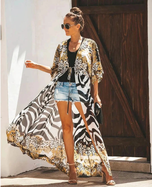 Mandotos Breeze Kimono Dress featuring flowing fabric, wide sleeves, and a relaxed fit perfect for summer wear.