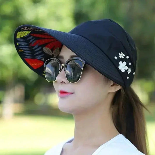 Mandotos Breezy Pearl Visor Hat featuring a wide brim and pearl accents, perfect for sun protection and stylish outdoor wear.