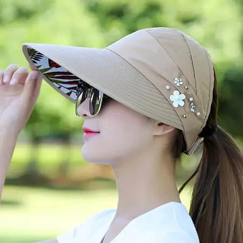 Mandotos Breezy Pearl Visor Hat with wide brim and pearl accents, perfect for sun protection and stylish summer wear.