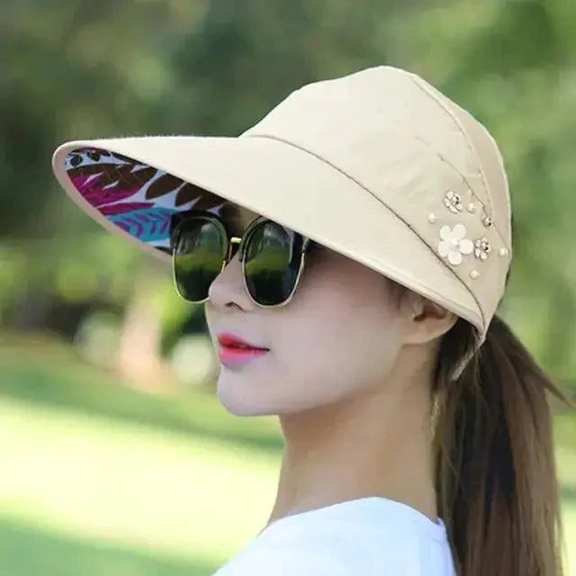 Mandotos Breezy Pearl Visor Hat with wide brim and pearl accents, perfect for sun protection and summer style.
