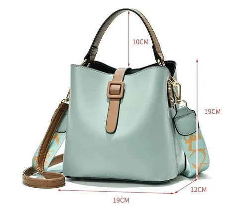 Mandotos Korean style bucket shoulder bag for women, fashionable cross-border female bag with trendy design and versatile carry options.