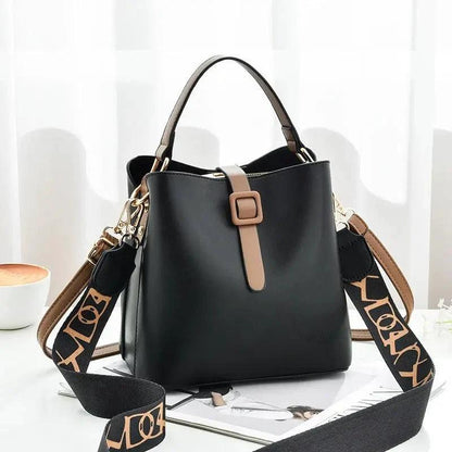 Mandotos Korean style bucket shoulder bag with crossbody strap, fashionable female bag made of durable material.