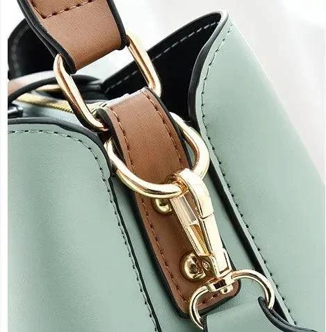 Mandotos Korean style bucket bag with shoulder strap, fashionable cross-border female bag in black leather with stitching details.