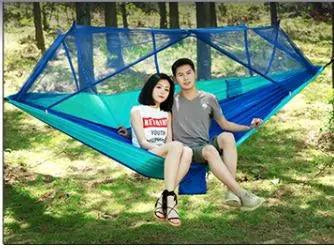 Mandotos Bug-Free Camp Hammock with mosquito protection, ideal for outdoor relaxation for two people.
