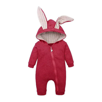 Pink bunny ear baby onesie by MANDOTOS, soft cotton fabric with adorable bunny ear hood for cute infant comfort.